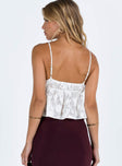 Crop top Sheer material Adjustable shoulder straps V neckline Tie detail at bust Frill trim