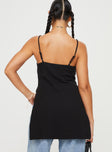 Top Adjustable shoulder straps, scooped neckline, slits at side