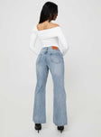 Wide leg jeans mid-wash denim Belt looped waist five pocket design zip and button fastening