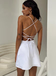 White mini dress Silky material Adjustable shoulder straps Low back Lace up back with tie fastening Invisible zip fastening at side