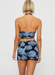 Floral two-piece set V-neckline top, halter style, mini skirt, wrap tie fastening detail, elasticated waistband