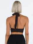 Crop top Sheer mesh material  Halter neck tie fastening  Plunging neckline Boning through waist  Good stretch   Lined bust 