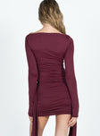 Long sleeve mini dress Wide neckline Ruching at side Frill and flower details Good stretch