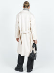 Oversized coat Lapel collar Twin front pockets Removable waist tie