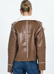 Jacket Faux leather material Faux fur lining Silver-toned hardware Classic collar Zip fastening at front Twin hip pockets