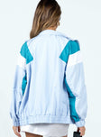 Blue Jacket Mock neckline Zip fastening at front Twin hip pockets Elasticated cuffs & waistband