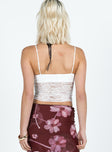 Lace cami top, slim fitting, v-neckline Fixed shoulder straps, frill detail