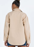 Beige jacket Soft material Pointed collar Button fastening at front Twin chest pockets Single button cuff