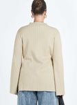 Sweater Ribbed material Mock neckline Splits at side hem Flared cuff