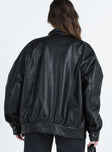 Black leather jacket Faux leather material High neckline Silver-toned hardware Zip fastening at front Twin hip pockets Press button cuff Non-stretch Fully lined