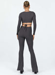 Grey long sleeve jumpsuit Ribbed material Square neckline Cut out at back with tie fastening Good stretch Partially lined