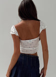 Floral pointelle crop top Cap sleeve, square neckline, ruched bust, ribbon detail Good stretch, lined bust