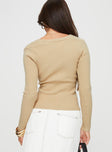 Sweater  Knit-like material, cross over design, v-neckline, long sleeve Good stretch, unlined 