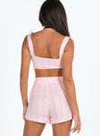 Matching set Crop top Fixed straps Invisible zip fasting at side High waisted shorts Belt loops at waist Zip and button fastening Subtle pleats at waist Twin hip pockets