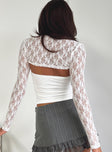 Two-piece top  Long sleeve lace bolero, tube top with ruching at side & split hem Good stretch, lined tube top