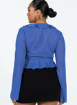 Blue long sleeve top Sheer material Frill neckline & hem Tie fastening at bust Flared sleeves Non stretch Unlined