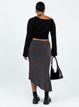 Midi skirt Sparkle material Asymmetrical lettuce edge hem Good stretch Partially lined