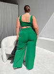 Matching set green Crop top Fixed straps Invisible zip fasting at side High waisted pants Wide relaxed leg Belt loops at waist Zip & button fastening