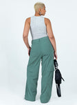 Green pants Cord material  Zip & button fastening  Belt looped waist  Four pocket design  Faux flap pockets on leg  Wide leg 