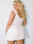 White mini dress Embroidered detailing throughout Sweetheart neckline Frill sleeves Tie at bust Invisible zip fastening at back Non-stretch Fully lined 