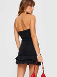 Strapless mini dress Ruching all throughout, center frill detail along front, two tiered frill hem