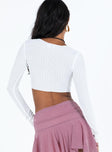 White long sleeve top Textured material Cropped design V neckline Tie fastening at front Good Stretch Unlined 