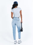 Jeans High rise Light wash denim Belt looped waist Zip and button fastening Classic five pocket design Slim leg 