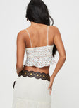 Floral print crop Elasticated straps, lace detailing, shirred back panel, tie front fastening