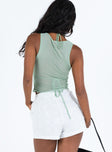 White shorts Broderie anglaise material Thick elasticated waistband Twin hip pockets