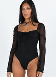 Long sleeve black bodysuit slim fitting Mesh material Ruches bust Exposed back Twin tie fastening at back High cut leg Cheeky style bottom Press clip fastening