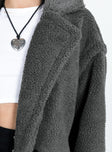 Coat Collared neckline Front button fastening Twin side pockets