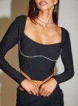 Long Sleeve Top Square neckline, boning at waist, diamonte detail around bust  Elasticated shoulders and back, crop style  Inner silicone strip at shoulders, zip fastening at back