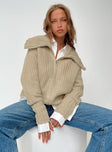 Beige sweater Knit material Oversized collar Zip fastening at front Good stretch Unlined 