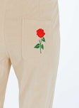 Beige pants Corduroy material Belt looped waist Zip and button fastening Classic five-pocket design Embroidered design at back Straight leg