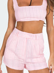 Matching set Crop top Fixed straps Invisible zip fasting at side High waisted shorts Belt loops at waist Zip and button fastening Subtle pleats at waist Twin hip pockets