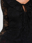 Black Long sleeve top Lace material, v neckline, tie fasting at front, frill detail throughout