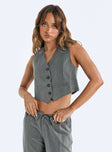 Vest top Pinstripe print V neckline Button fastening at front Faux pockets Pointed hem