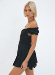 Black mini dress Shirred waistband Ruffle detailing Elasticated neck and sleeves Can be worn on or off shoulder Built in shorts Layered ruffle hem Fully lined