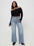 Wide leg jeans mid-wash denim Belt looped waist five pocket design zip and button fastening