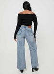 Wide leg jeans mid-wash denim Belt looped waist five pocket design zip and button fastening